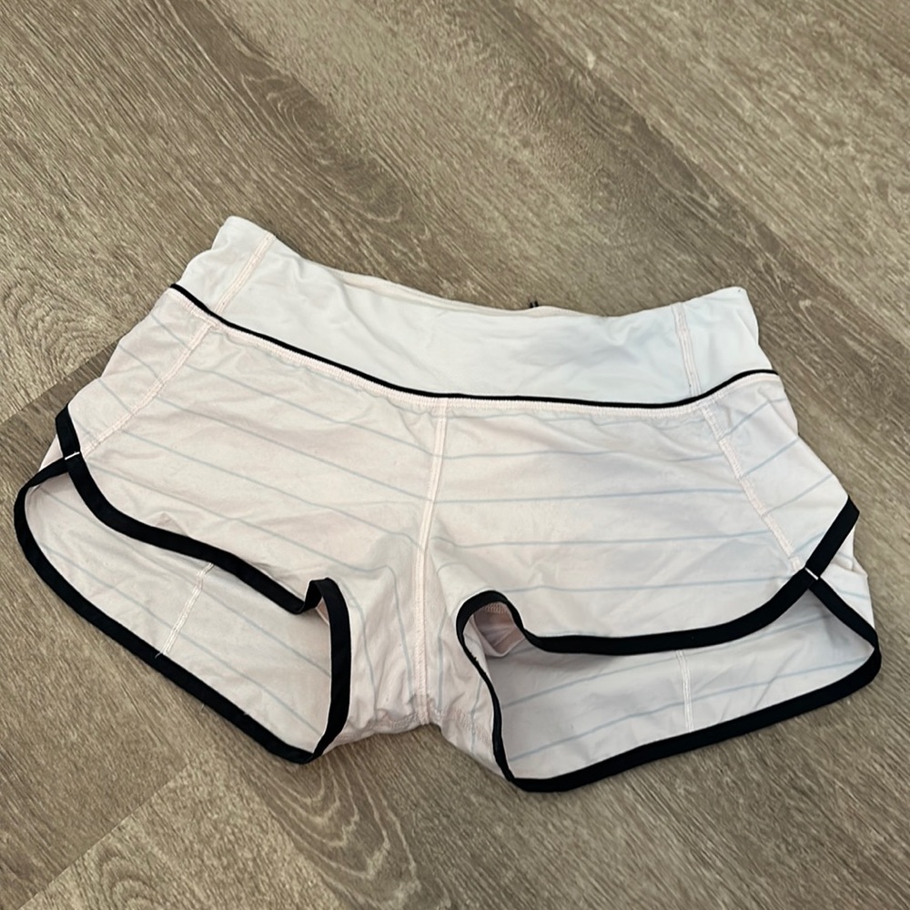 Lulu lemon light pink and gray striped Speed Up low rise shorts